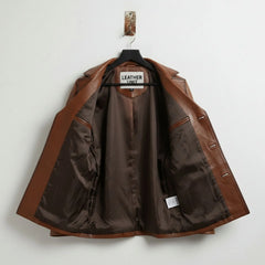 inside of men's brown leather blazer jacket showing satin lining and inner pockets.