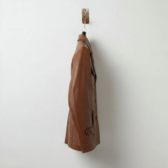side profile of men's brown leather coat with button front