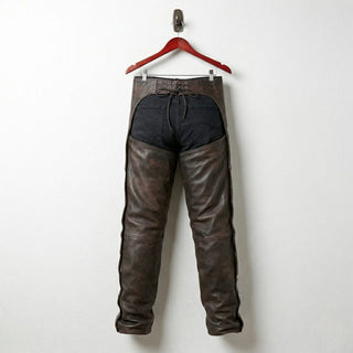 Back view of men's brown leather chaps showing open seat and lace-up waist