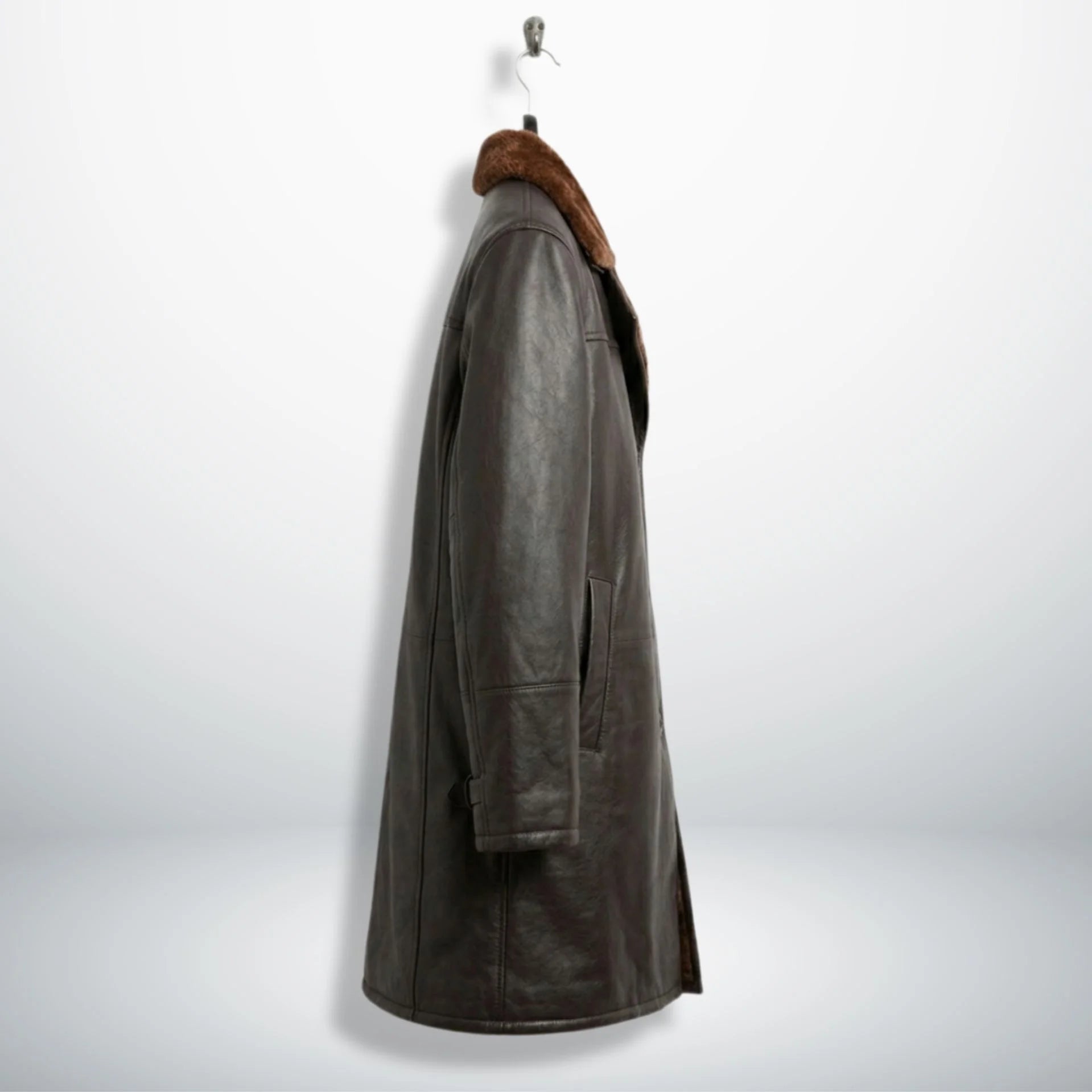 Side profile of men’s dark brown shearling leather overcoat