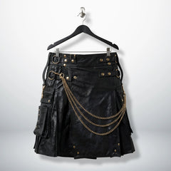 Front view of men's black gothic leather utility kilt with gold chains and pockets