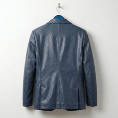 Back view of men's navy leather blazer with clean tailored seams.