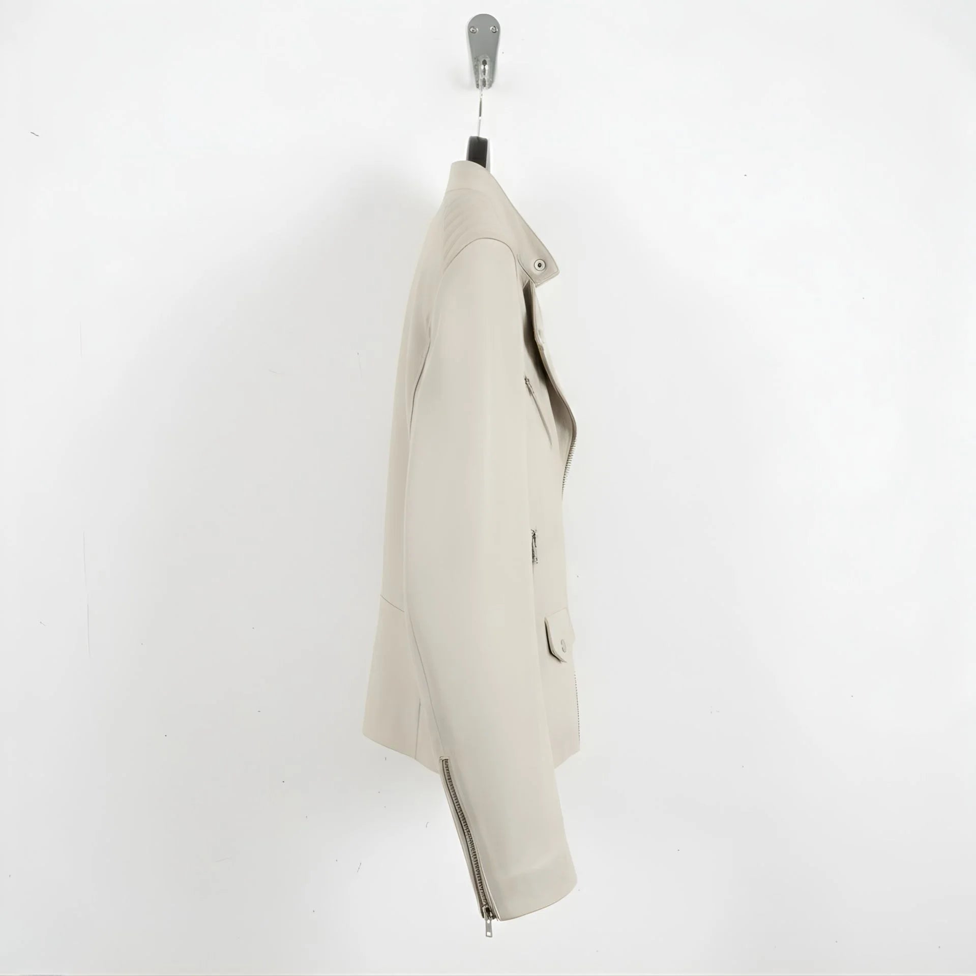 side profile of men's off white moto leather jacket with zipper cuffs.