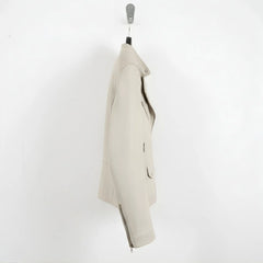 side profile of men's off white moto leather jacket with zipper cuffs.