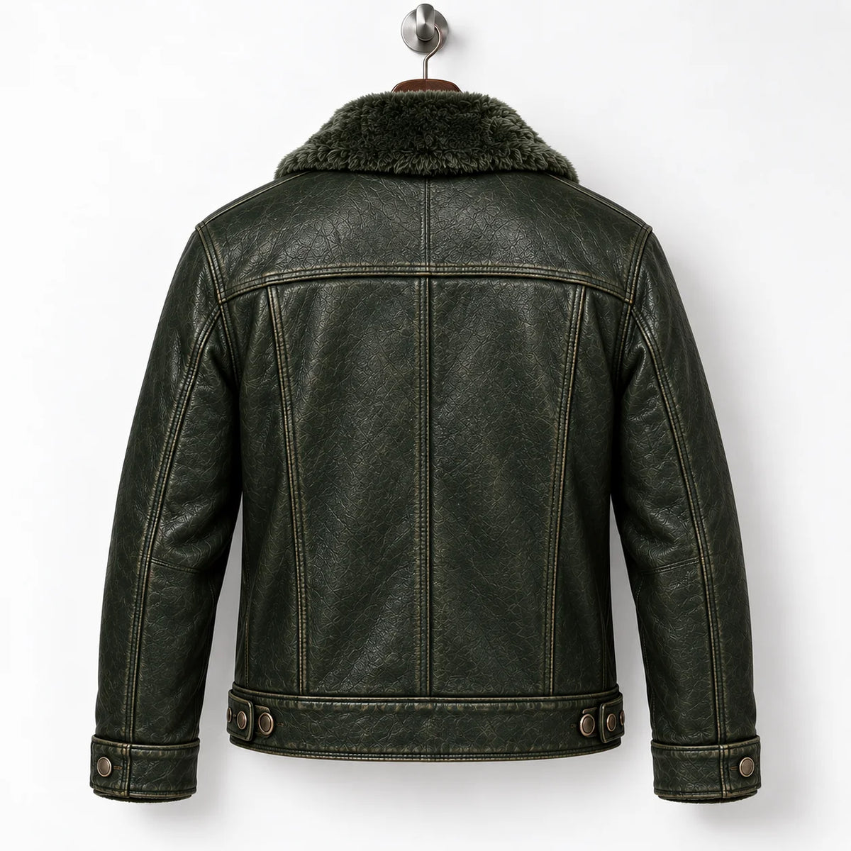 Back hanger view of olive green trucker jacket showing panel seams, shoulder yoke and side waist tabs