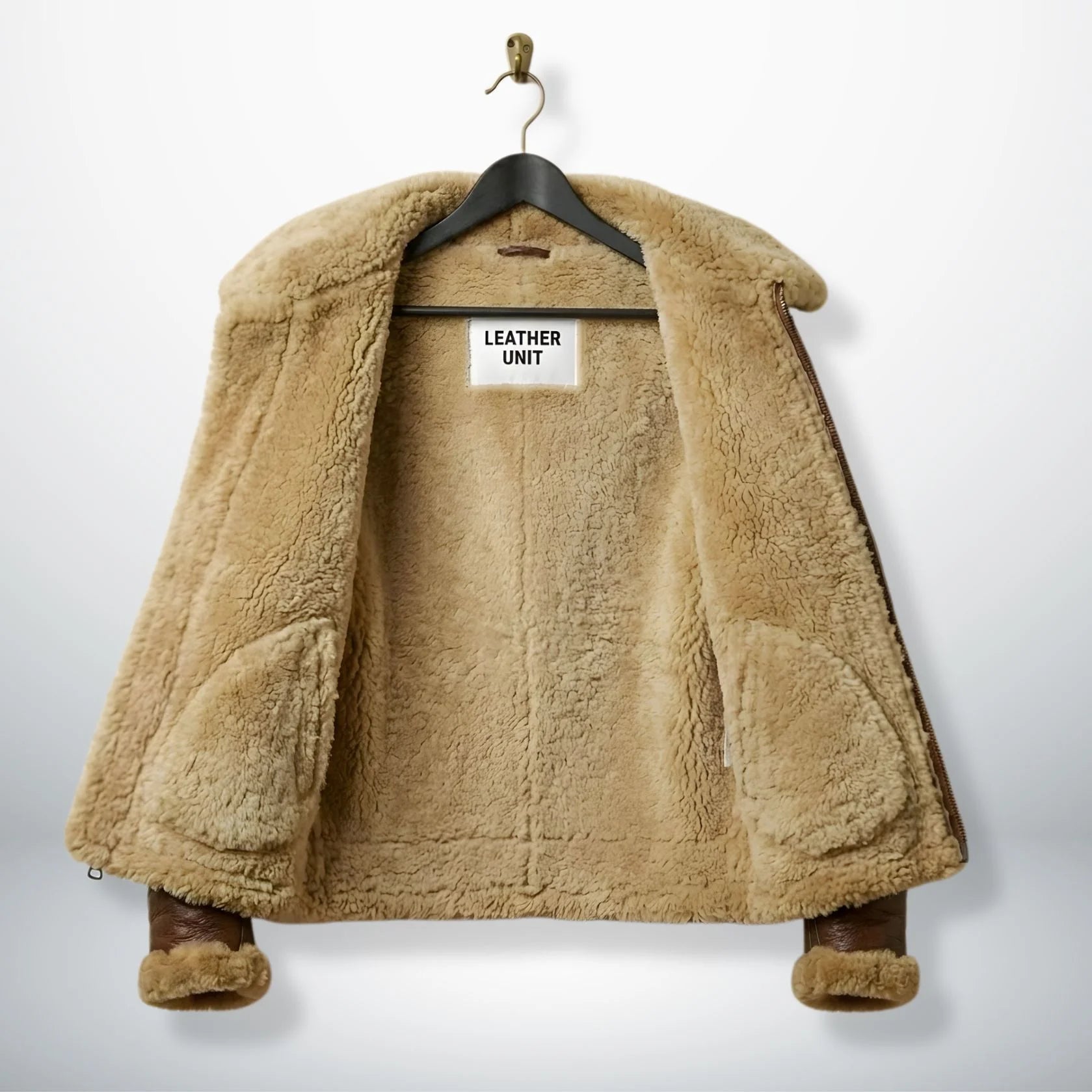 inside view mens pilot flying b3 jacket showing full tan faux shearling lining.