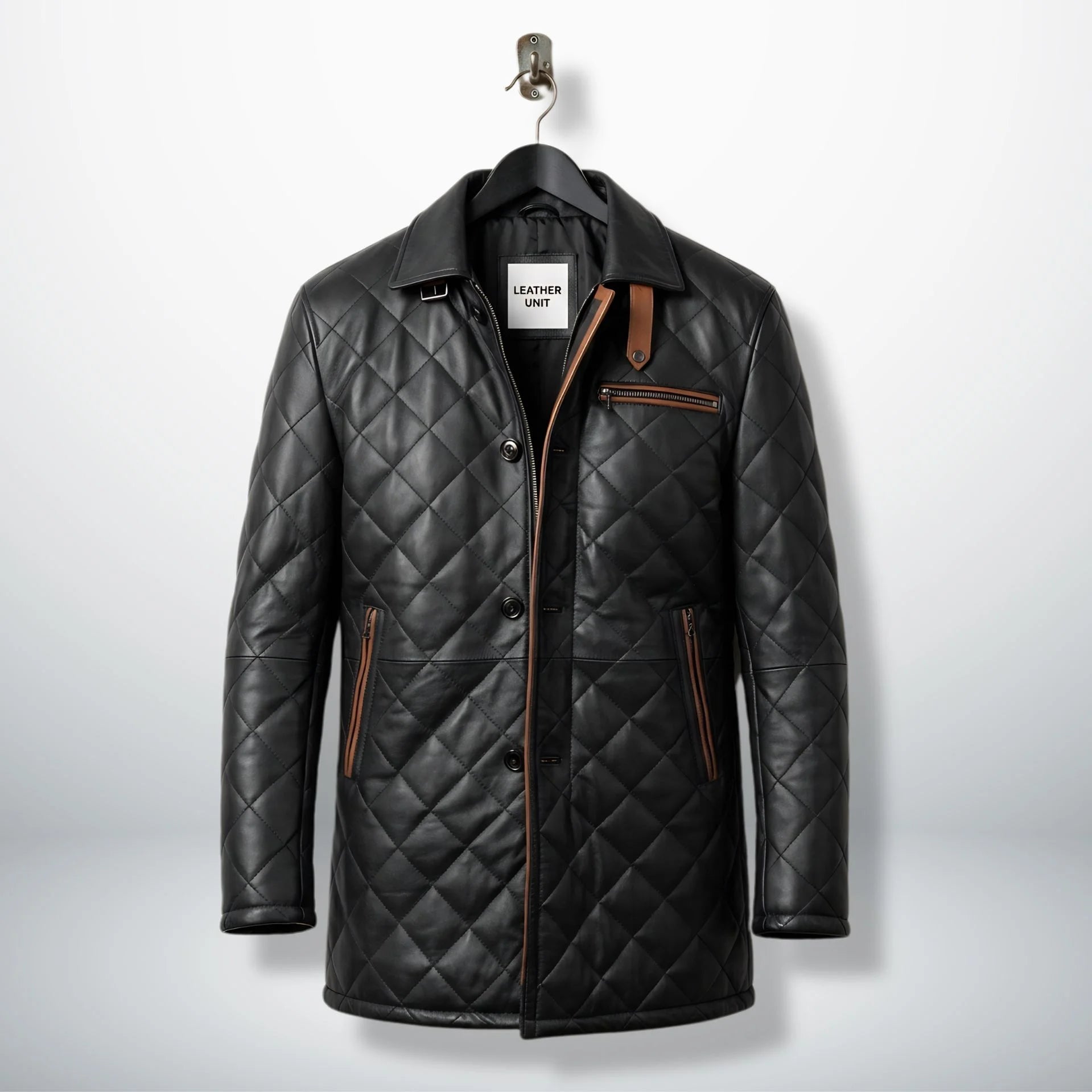 Front view of men’s black quilted leather car coat with brown trim by Leather Unit