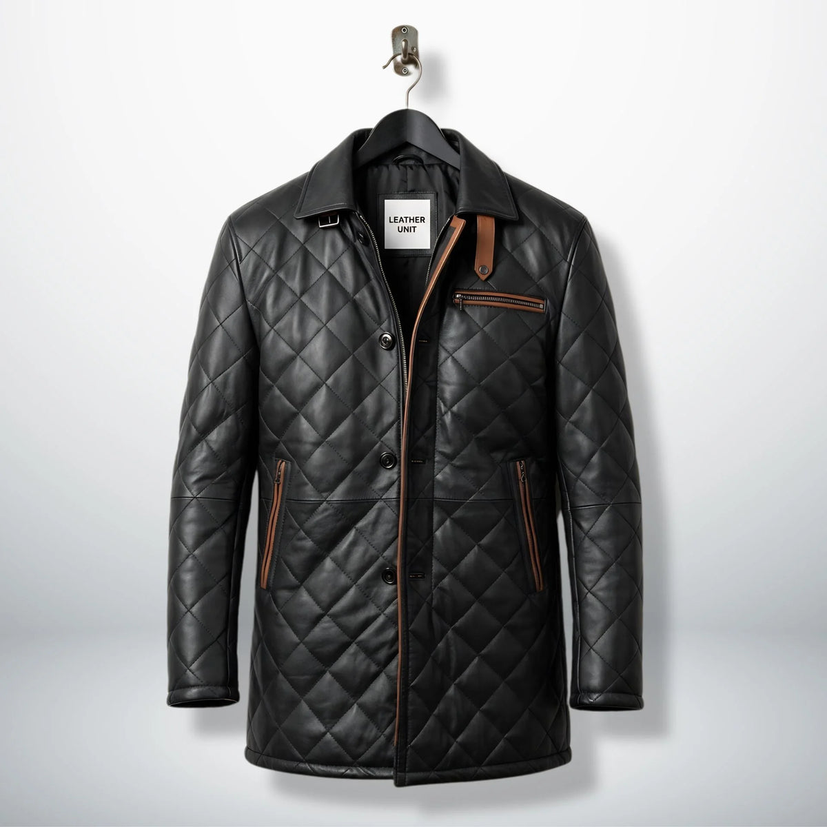 Front view of men’s black quilted leather car coat with brown trim by Leather Unit