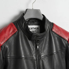 close up of collar and zipper on men's red and black leather moto jacket.