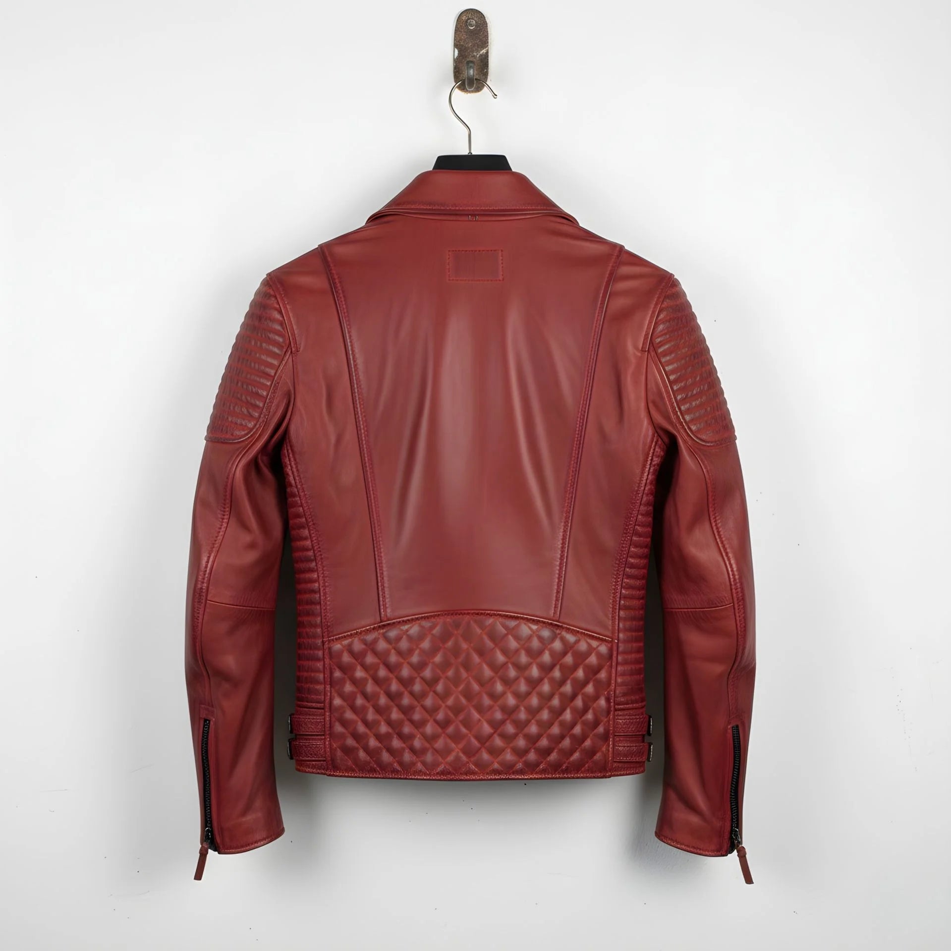 back view of men's red leather motorcycle jacket with diamond quilted back panel.