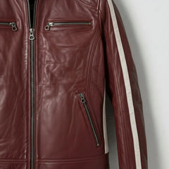 Close up of chest zipper pockets on men's red leather biker jacket.