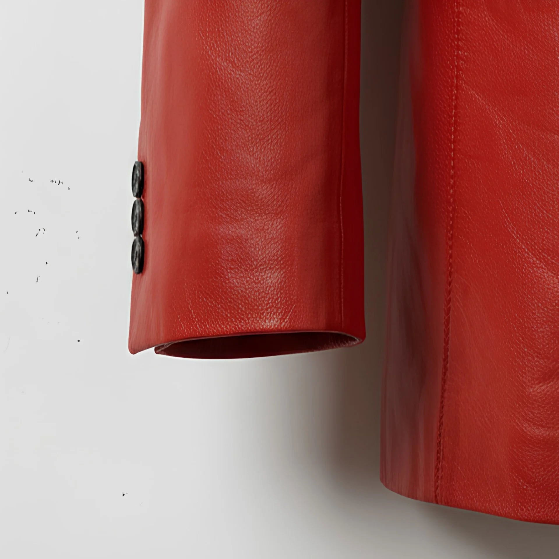 Sleeve cuff buttons detail on men’s red leather tuxedo blazer
