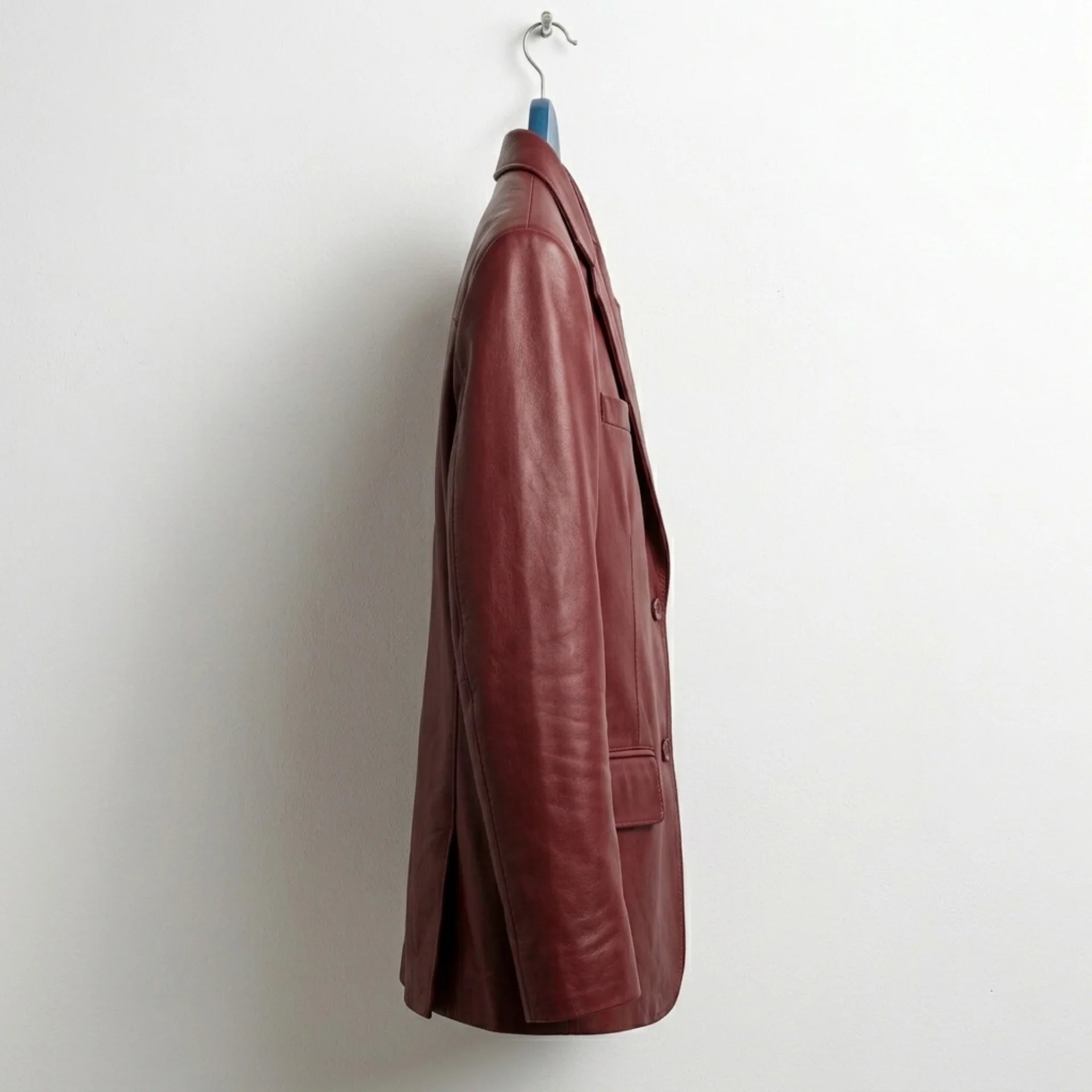 Side profile of men’s wine red leather blazer jacket