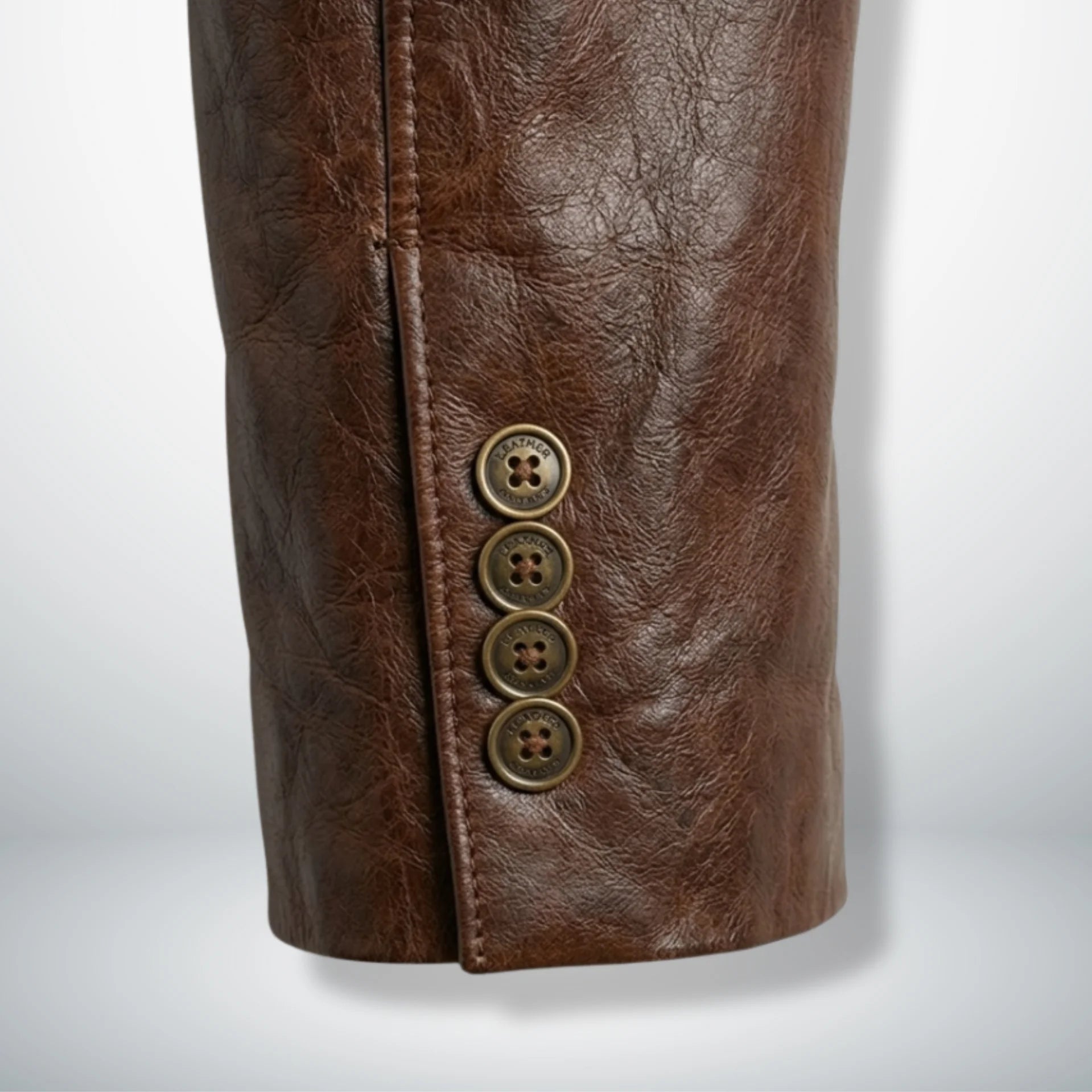Sleeve cuff buttons detail on men’s Spanish brown leather blazer