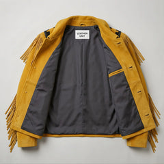 Interior of tan suede fringe western jacket showing grey lining and inner pocket.
