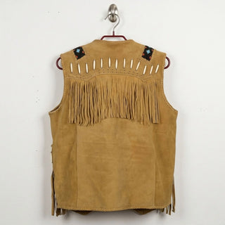 Back view of men's tan suede western vest with fringe and bone detailing.