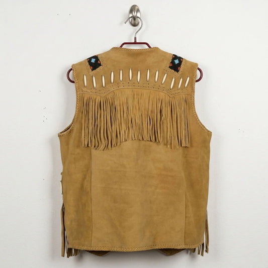 Back view of men's tan suede western vest with fringe and bone detailing.