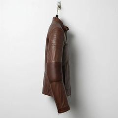 side profile of men's vintage brown cafe racer jacket with quilted shoulder.