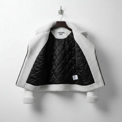 interior of mens white shearling leather jacket with quilted lining.