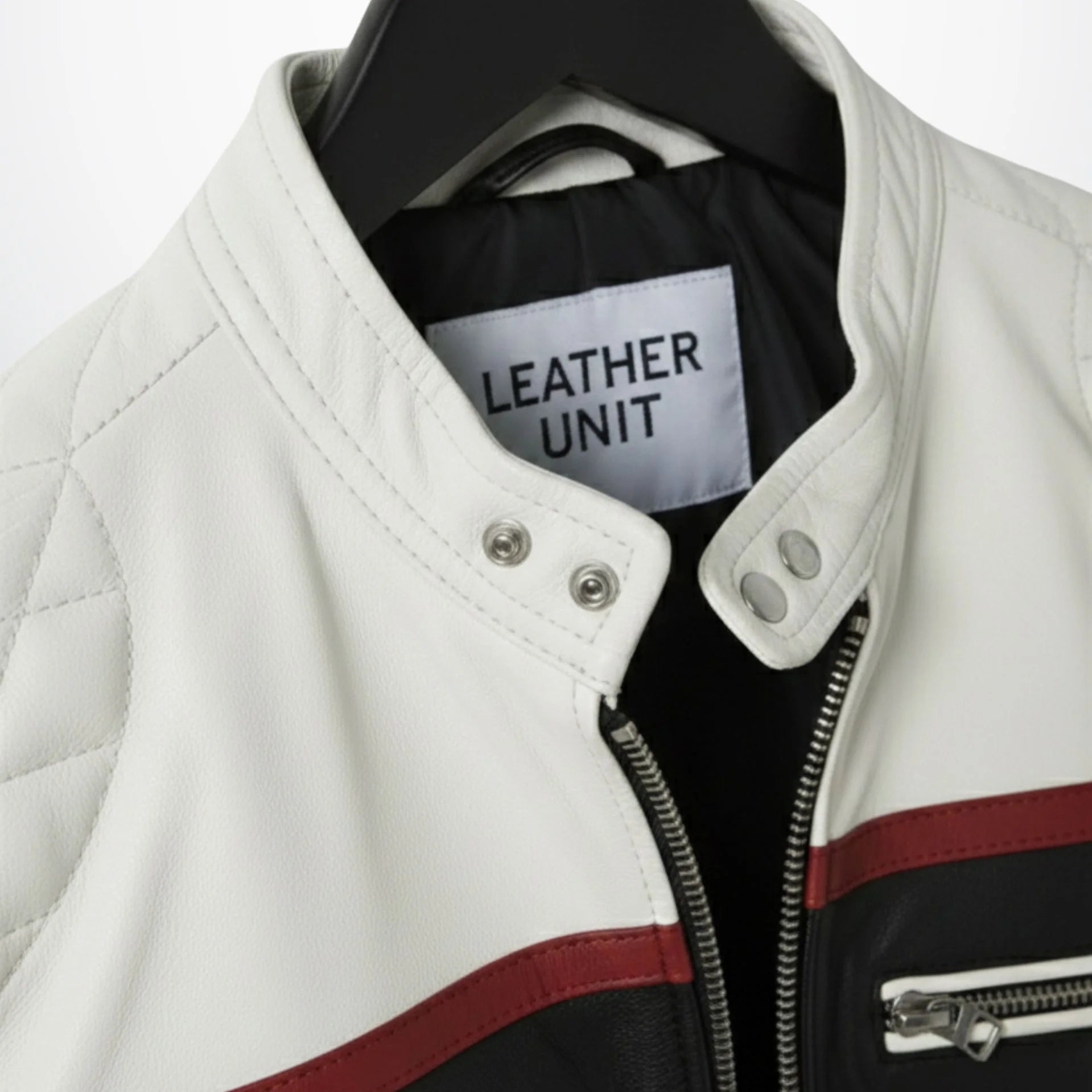 close up of collar and snaps on men's white and black leather biker jacket by Leather Unit.