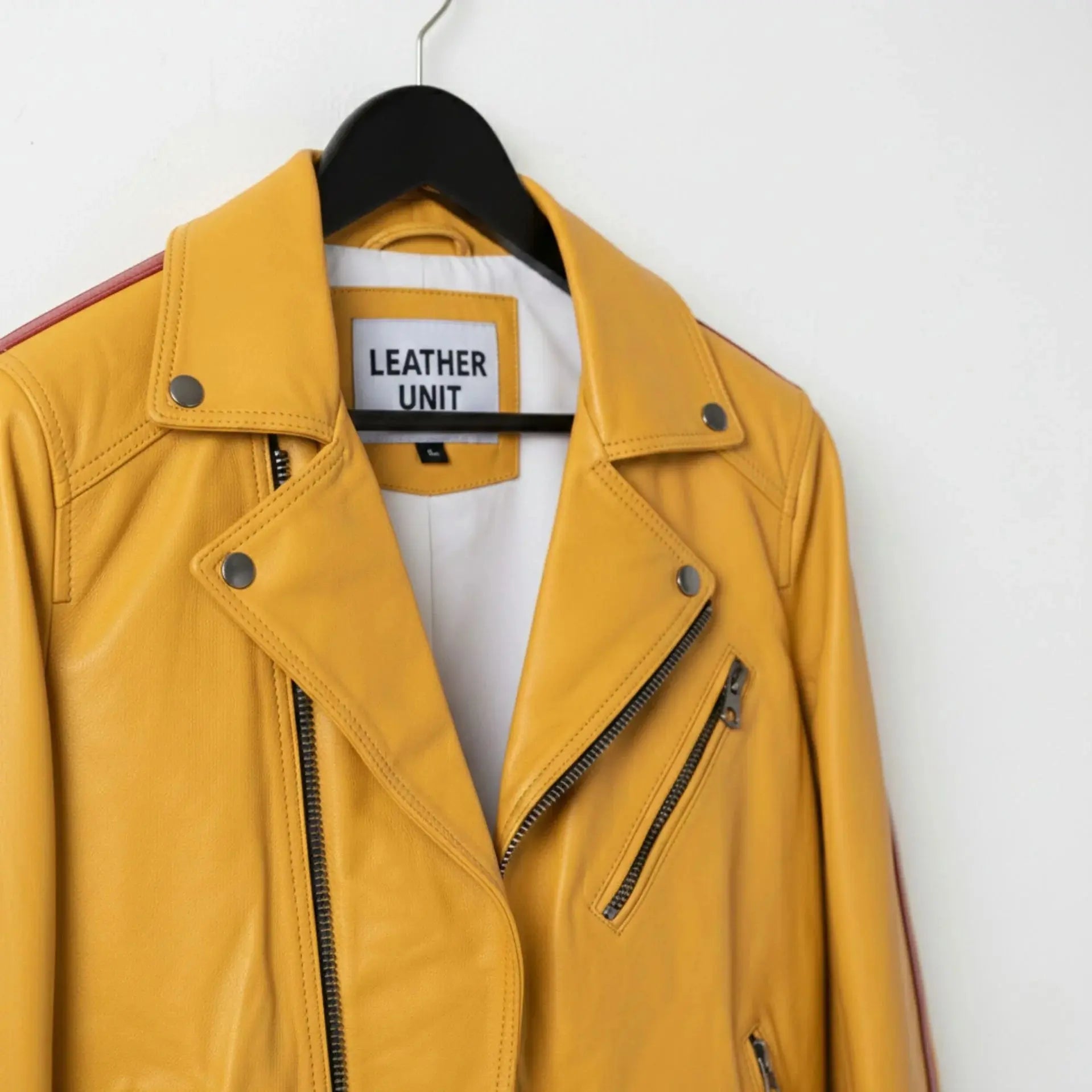 close up of collar and zippers on men's yellow leather motorcycle jacket by Leather Unit.