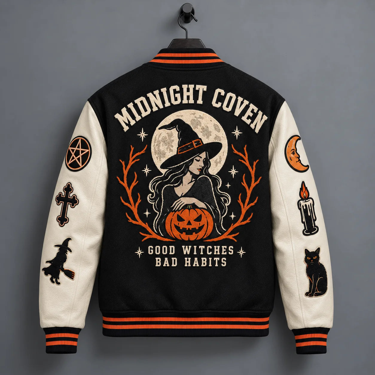 Hanging back view of Halloween varsity jacket with Midnight Coven witch, full moon, pumpkin and embroidered lettering