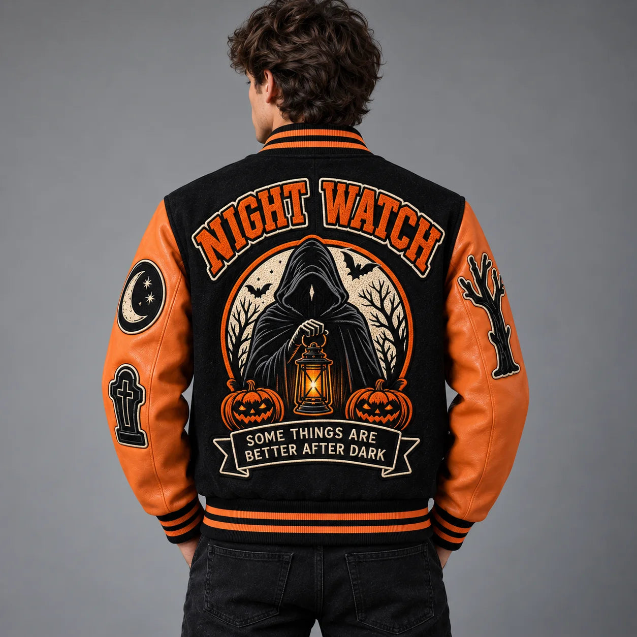 Model back view of Night Watch Halloween varsity jacket with large Grim Reaper, lantern, pumpkins and bat embroidery