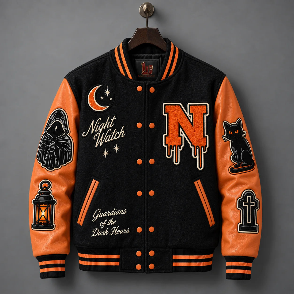 Hanging front view of Night Watch varsity jacket with genuine orange leather sleeves, snap buttons and embroidered patches