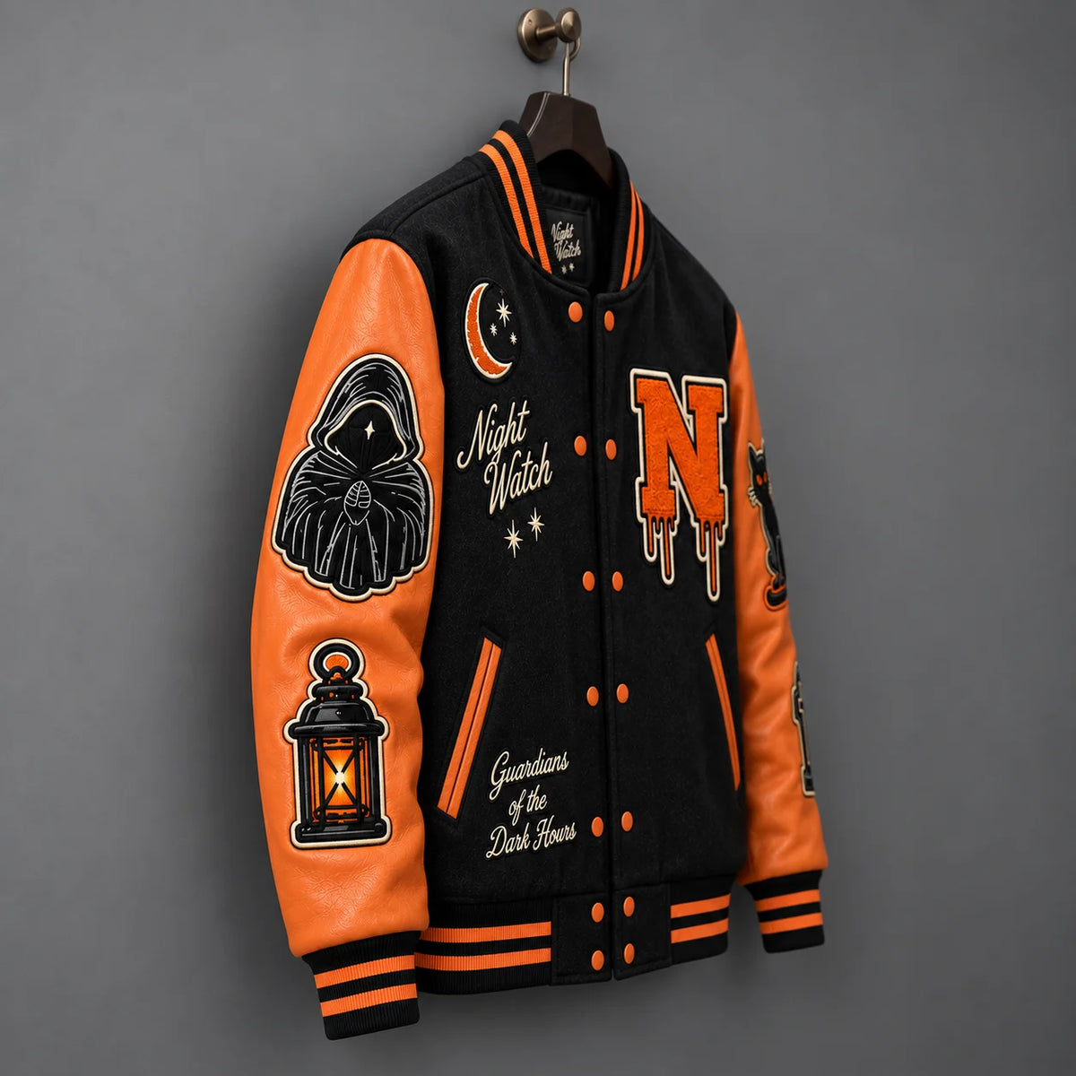 Side angle of Night Watch Halloween jacket showing orange genuine leather sleeve, hooded figure and lantern patches