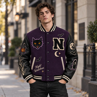 Outdoor front view of shadow-purple Night Watchers Halloween varsity jacket with black leather sleeves and gothic patches