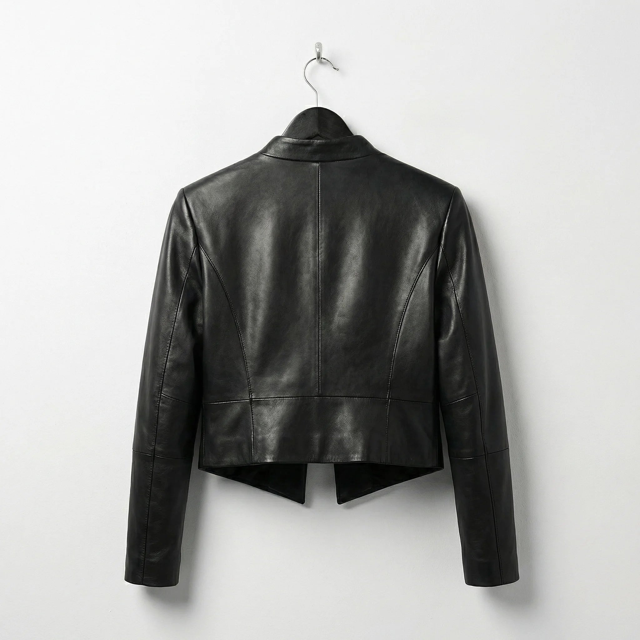 Back view of cropped collarless black leather jacket for women