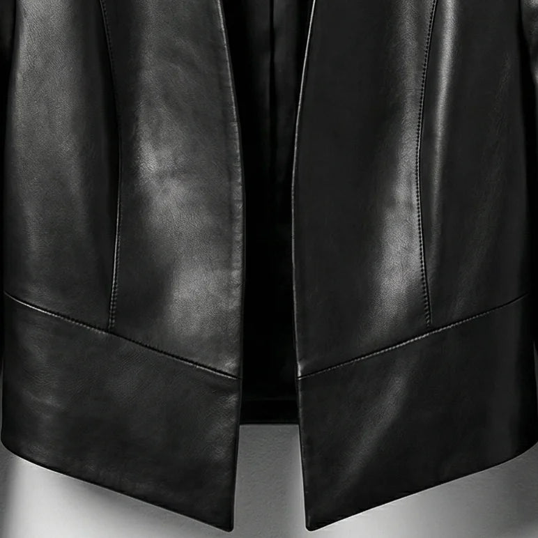 Cropped hem detail on womens minimalist black leather jacket