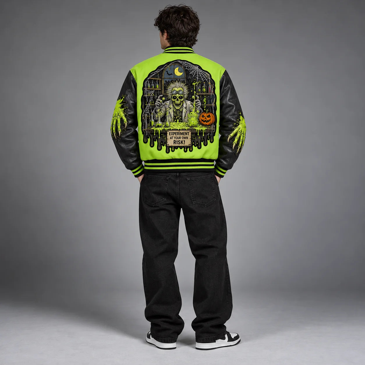 Back studio view of Slime Lab Halloween jacket showing mad scientist laboratory, pumpkins and dripping slime artwork