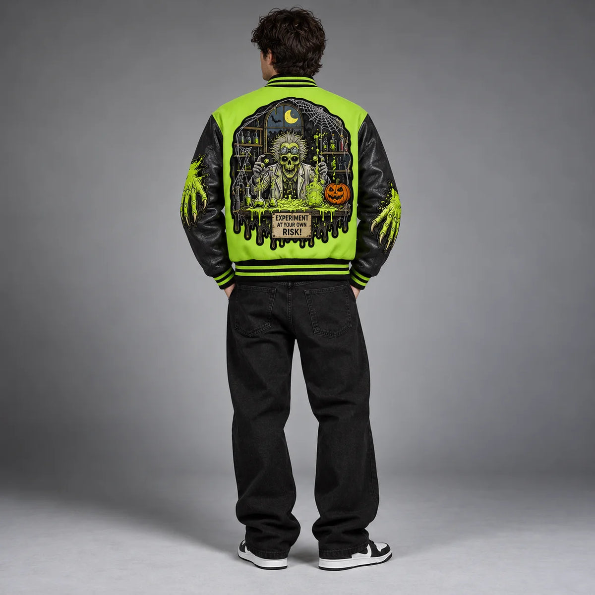 Back studio view of Slime Lab Halloween jacket showing mad scientist laboratory, pumpkins and dripping slime artwork