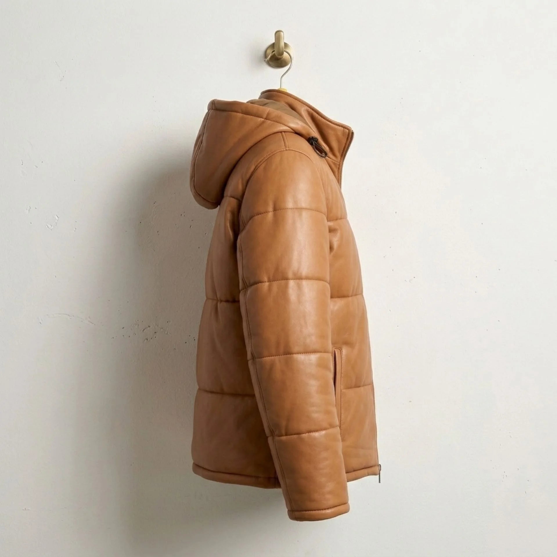 Side profile of Men's Tan Hooded Sheepskin Puffer Jacket