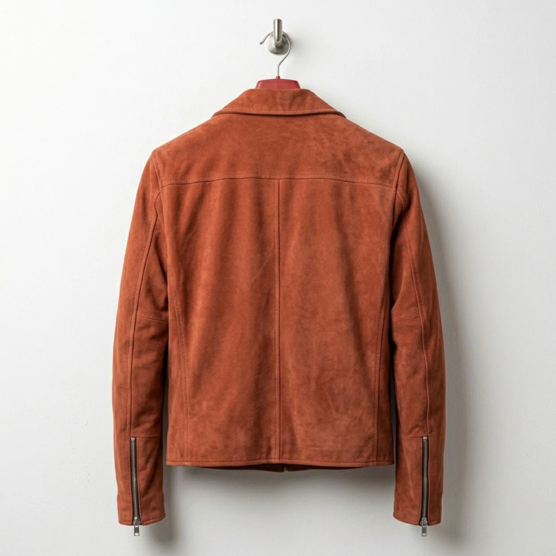 Back view of tan suede motorcycle jacket with zip cuffs
