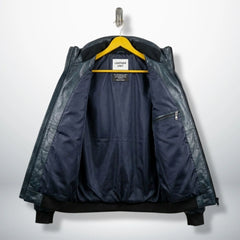 Interior view of Teal Leather Puffer Bomber Jacket with Leather Unit branding