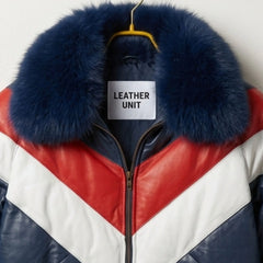 Close-up of luxurious navy fur collar on two-tone leather puffer jacket