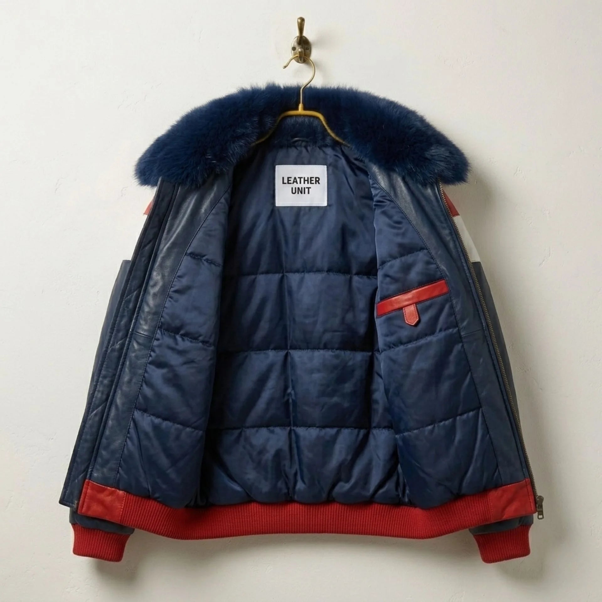 Interior view of Two-Tone Leather Puffer Jacket with premium lining and Leather Unit tag