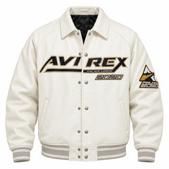 Front view of white graphic varsity bomber jacket with snap buttons, black gold chest artwork and side pockets