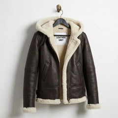 Front view of Leather Unit women’s brown B3 shearling aviator hooded leather jacket on hanger