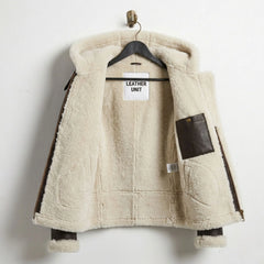 Inside view of women’s B3 aviator jacket showing full cream shearling lining and interior pocket