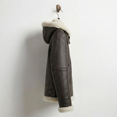 Side profile of women’s brown shearling hooded leather bomber jacket