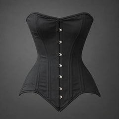 Front product view of black cotton overbust corset showing shaped bust panels and silver-tone busk fastening