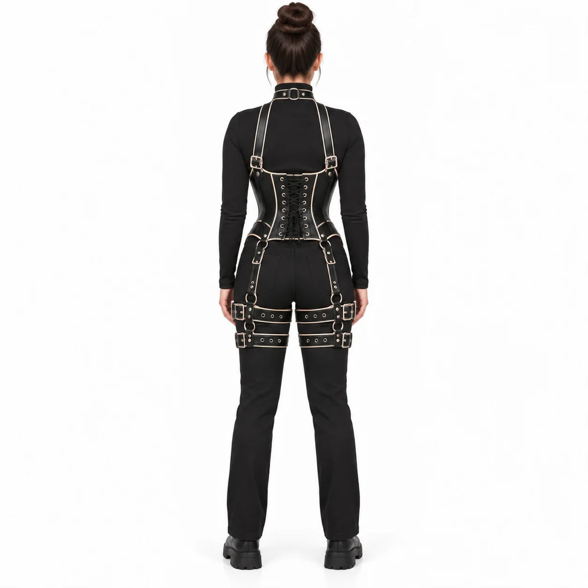 Full rear view of women's leather corset harness revealing eyelet lacing, adjustable back straps and symmetrical thigh buckles.