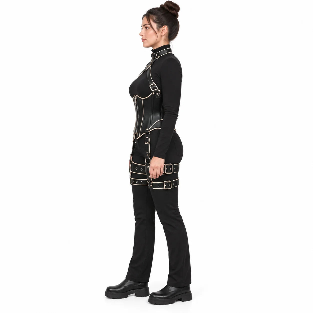 Side view of women's gothic black leather corset harness displaying ivory piping, fitted waist silhouette and thigh buckle details.