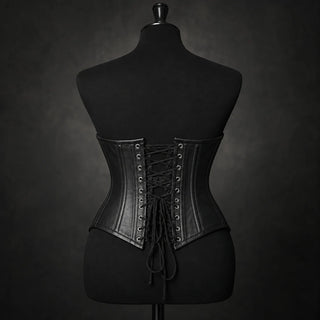 Back product view highlighting black cross lacing, metal-look eyelets and structured panel seams on the leather corset.