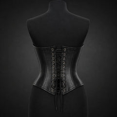 Rear mannequin view of black leather underbust corset showing adjustable cross lacing through rows of metal-look eyelets.