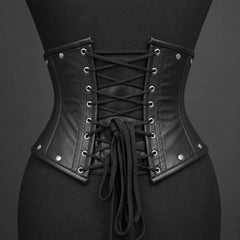 Back product view showing adjustable black cross lacing, rows of eyelets and stud accents on the leather corset.