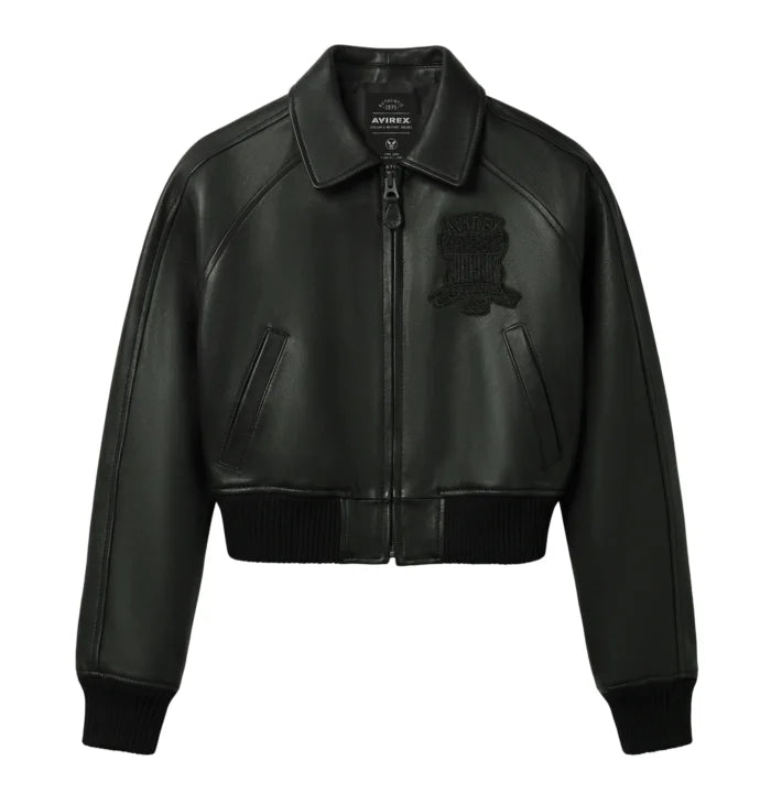 Women’s black cropped leather bomber jacket front view with zip closure, fold-down collar, welt pockets and rib-knit waist